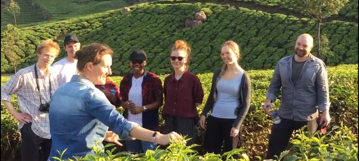 Students and teachers on a tea plantation