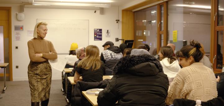 Maureen Watson, Volunteer English for Speakers of Other Languages Teacher, teaching a class at the University of Edinburgh