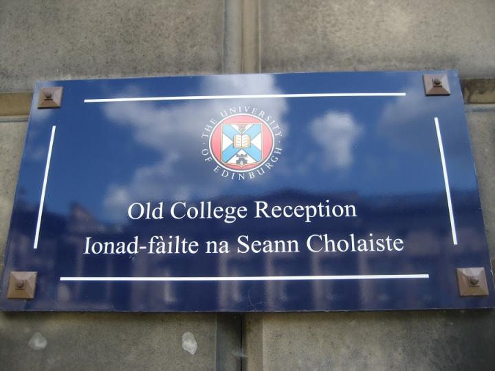 Bilingual sign outside Old College