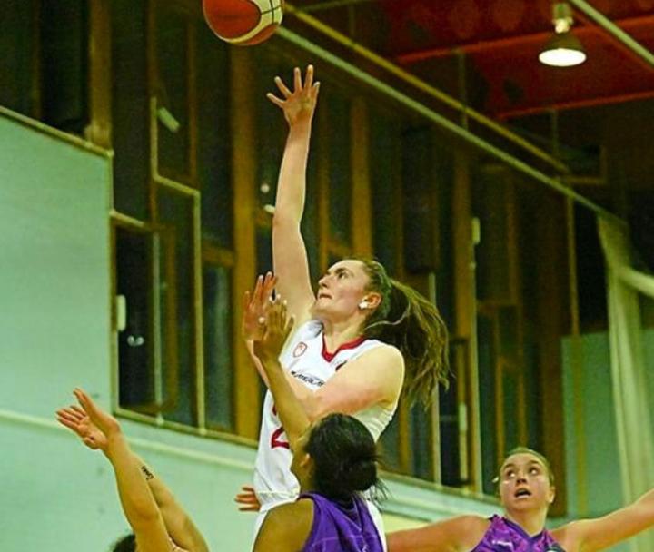 Elise Tweedie Playing Basketball