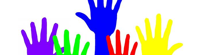 Image of different coloured hands reaching up