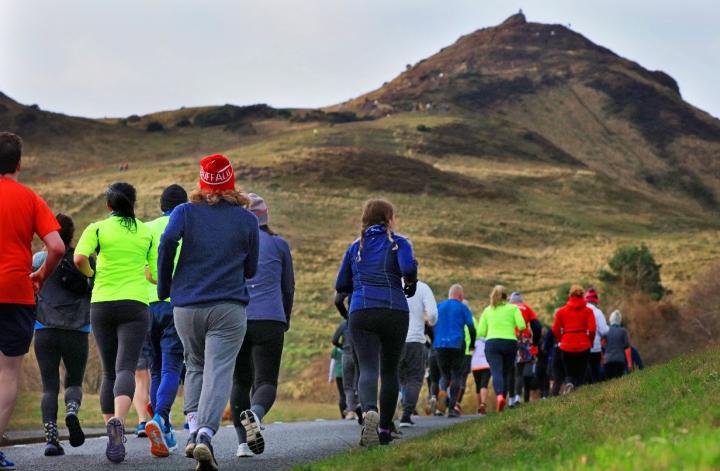 Runners in front of Arthur's Seat
