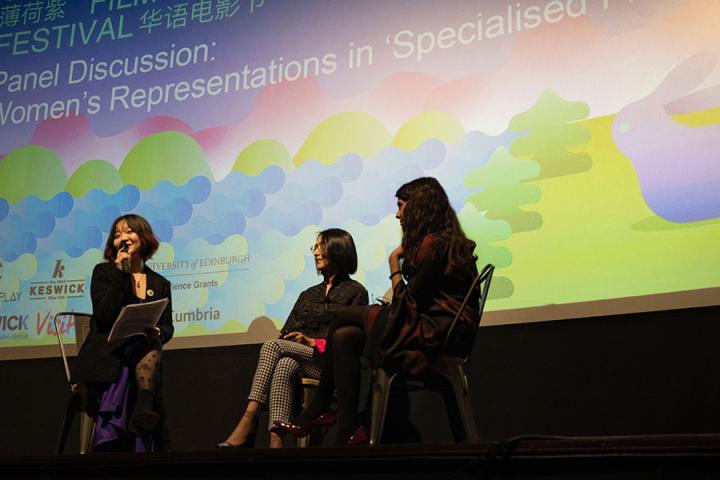 Photo of three women taking part in a panel discussion