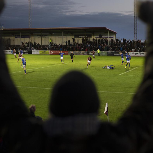 Home supporters celebrating Michael McKenna's equaliser as Arbroath play Queen of the South