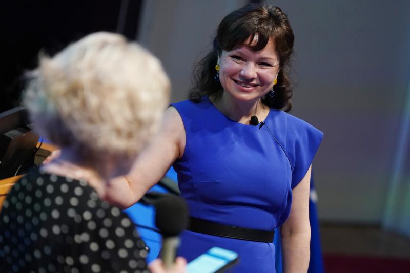 Olga Maksimova, founder of Lovat Compliance, speaks to colleague