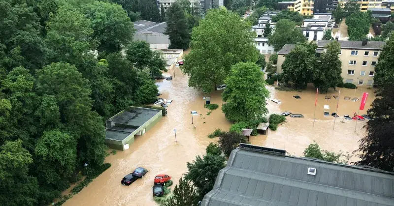 Aerial image of cars floating in flooded city streets