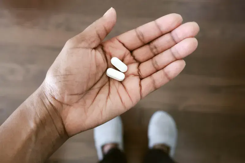 Hand holding tablets 