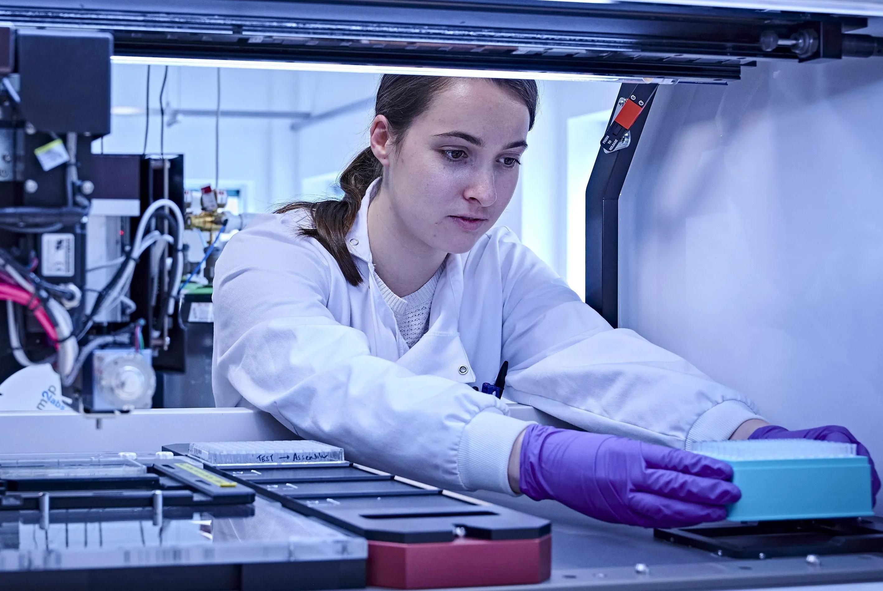 A member of staff at the Edinburgh Genome Foundry.