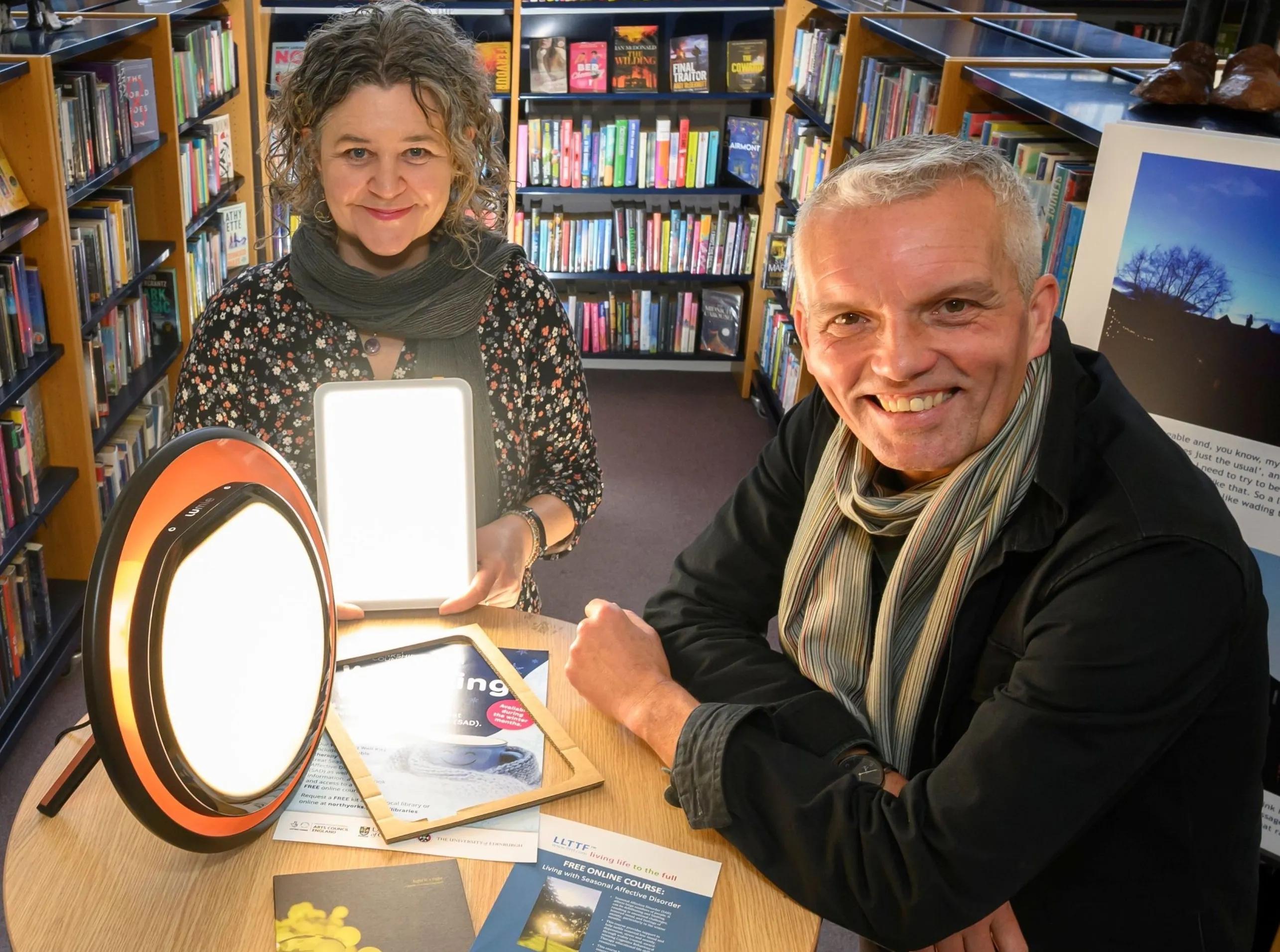 Professor Hester Parr and Professor Hayden Lorimer with the light boxes available to borrow from UK libraries.