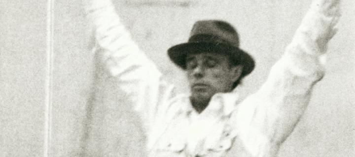 Joseph Beuys holding up a blackboard during his performance event Celtic (Kinloch Rannoch) Scottish Symphony, in studio C.08.