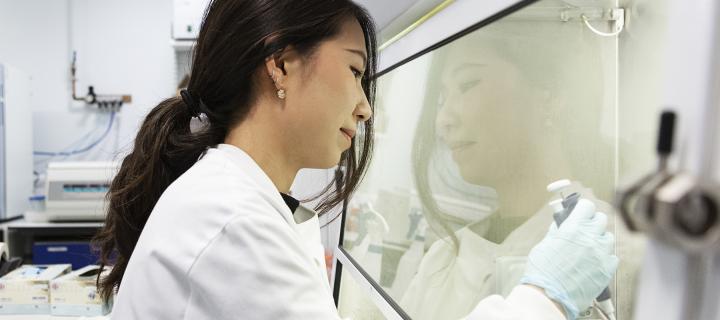 A student uses a sterile bio-safety cabinet