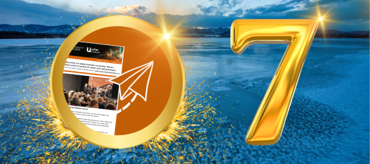 gold circle with Usher newsletter picture inside and the number 7