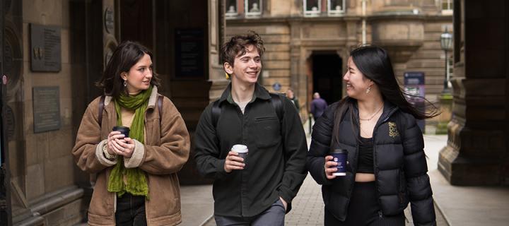 Students having a chat in front of Old Medical School, Teviot, Edinburgh