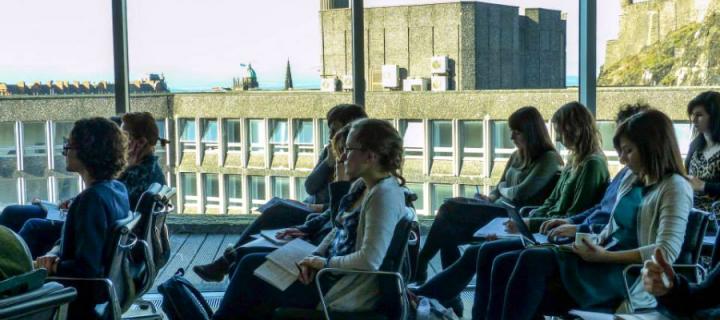 View of audience at the Psychoanalysis workshop with view of Edinburgh Castle in background.