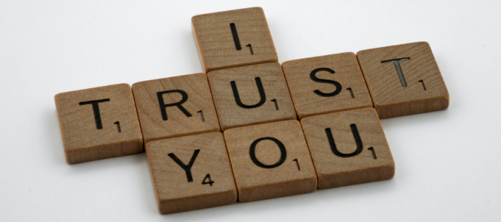 Scrabble letters which spell 'I trust you'