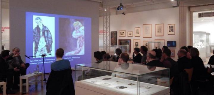 George Baselitz artwork projected onto screen at Café des Artistes event.
