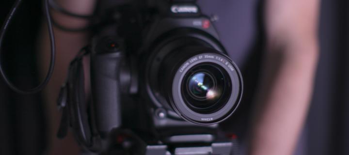 A close up of a film camera lens