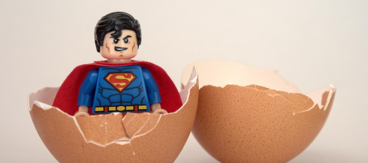 image of superman coming out of an egg