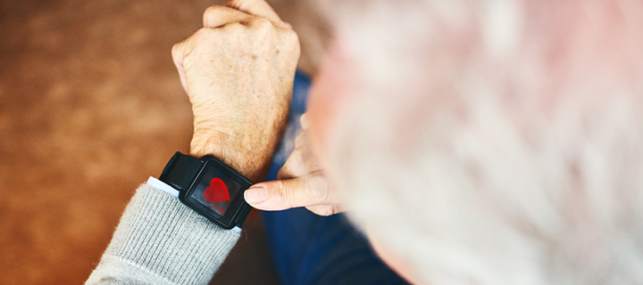 elderly man with smart watch 