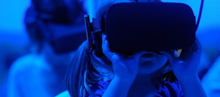 Children using VR goggles. 