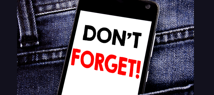 Mobile phone in a pocket with the text 'Don't Forget!'