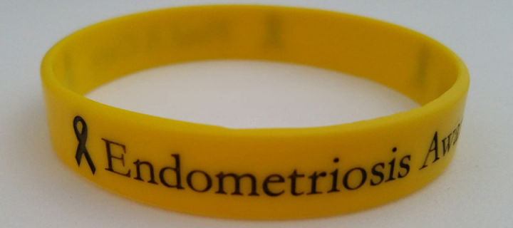 image of a yellow bracelet promoting endometriosis awareness month