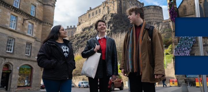 3 students chat and walk Edinburgh castle in background - e in coloured blocks on right