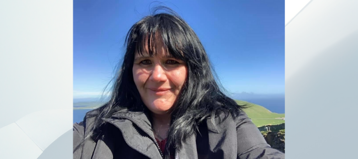 VIKING Volunteer Fiona Boubert at Sumburgh Head in Shetland. Photo placed on a wavy background
