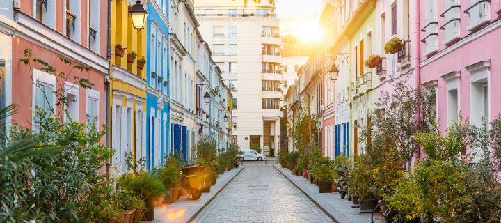 A colourful neighbourhood street in Paris at sunrise