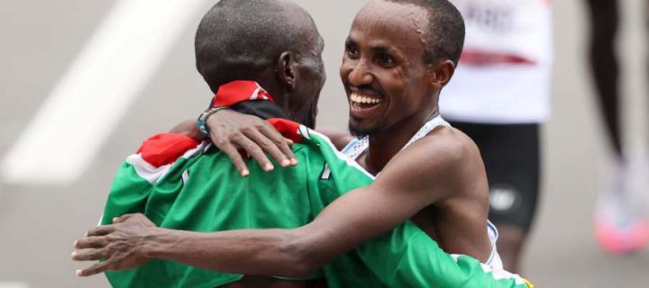 Marathon medallists Eliud Kipchoge and Abdi Nageeye hug after competing at 2020 Olympics
