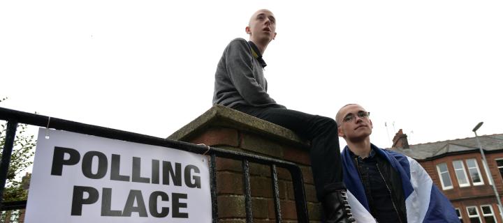 Two young people voting for the first time outside a polling place in the Scottish Independence Referendum 