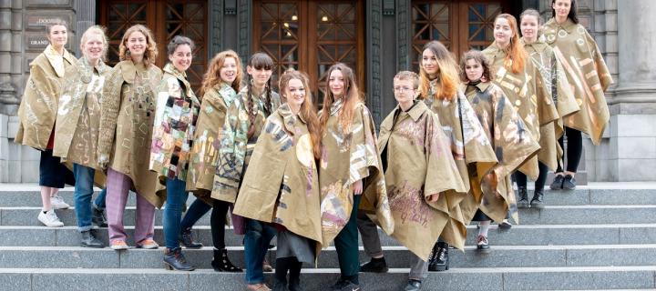 Students model their capes outside the Usher Hall.