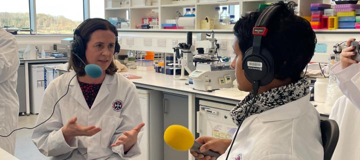 Jackie Maybin being interviewed in lab by Naga Munchetty on BBC Radio 5 