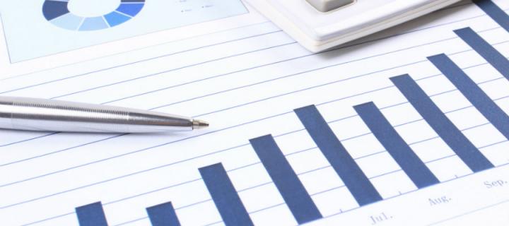 Statistical graph with calculator and pen.