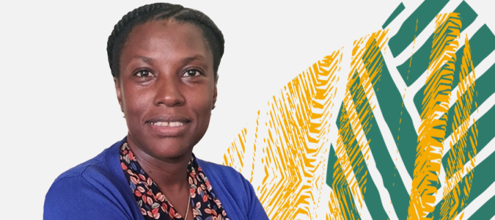 Portrait of Jennifer Namutebi with the MCF Phase 2 leaf branding in the background