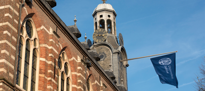Leiden University building and university flag