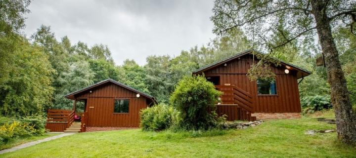 image of 2 log cabins