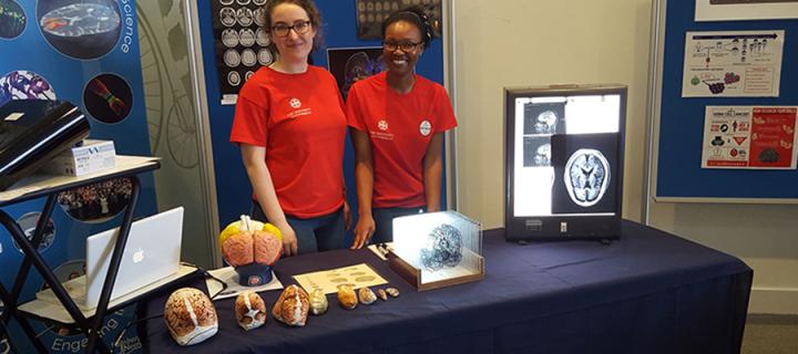 Photo of two group members at the Sci-Fest event