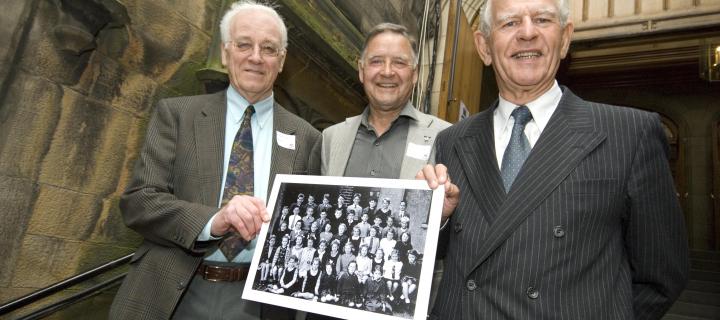 Lothian Birth Cohort participants with old school photo at reunion
