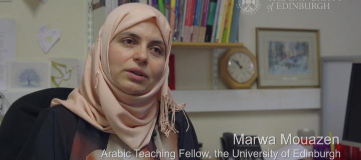 Marwa Mouazen speaking into the camera - screenshot from video