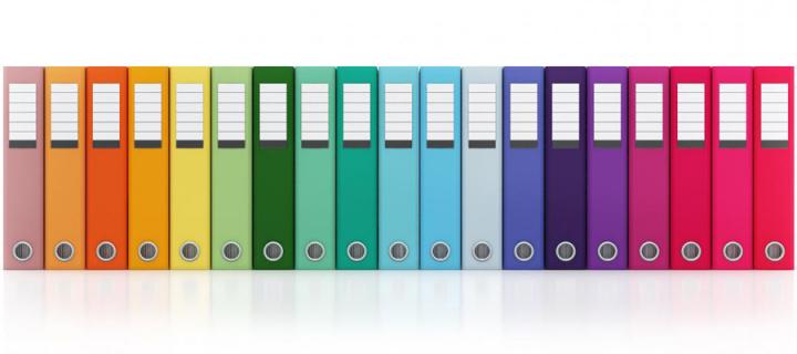 picture of colourful box files in a row