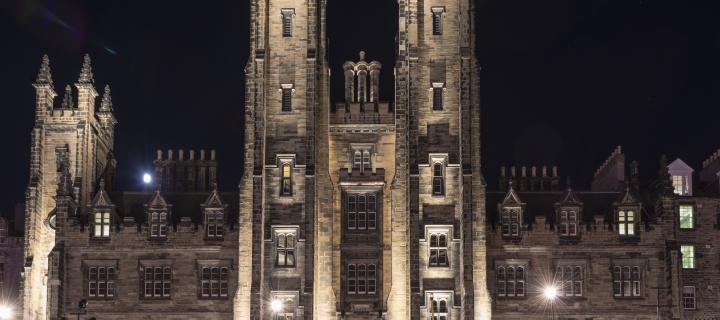 New College lights on at night 