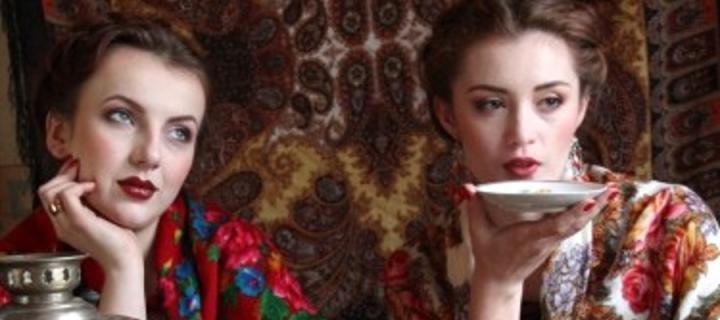 two women drinking tea in the Russian style