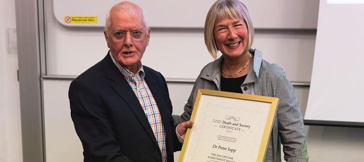 Dr Peter Jupp receiving his framed Lifetime Achievement certificate from Professor Hilary J. Grainger