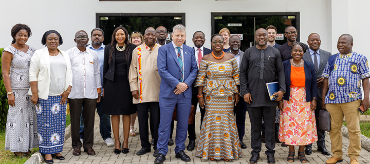 A group photo including Principal Sir Peter Mathieson on his visit to Ghana in March 2023