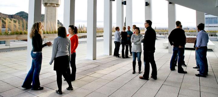 Photo of students and staff on the Informatics Forum rooftop