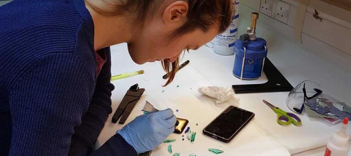 Researcher creating glass image of cells