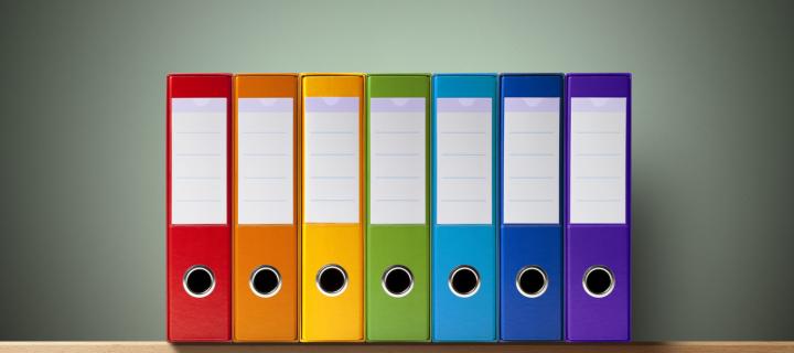 Image showing colourful ring binders on a shelf