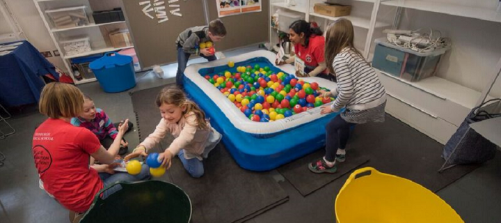 Image of children playing with a ball pool