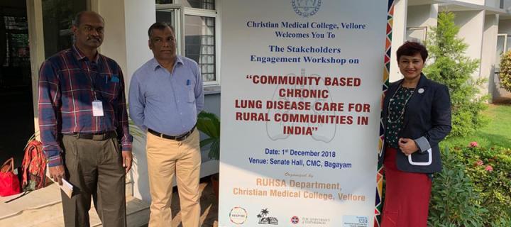 RESPIRE team members outside CMC Vellore stood next to banner